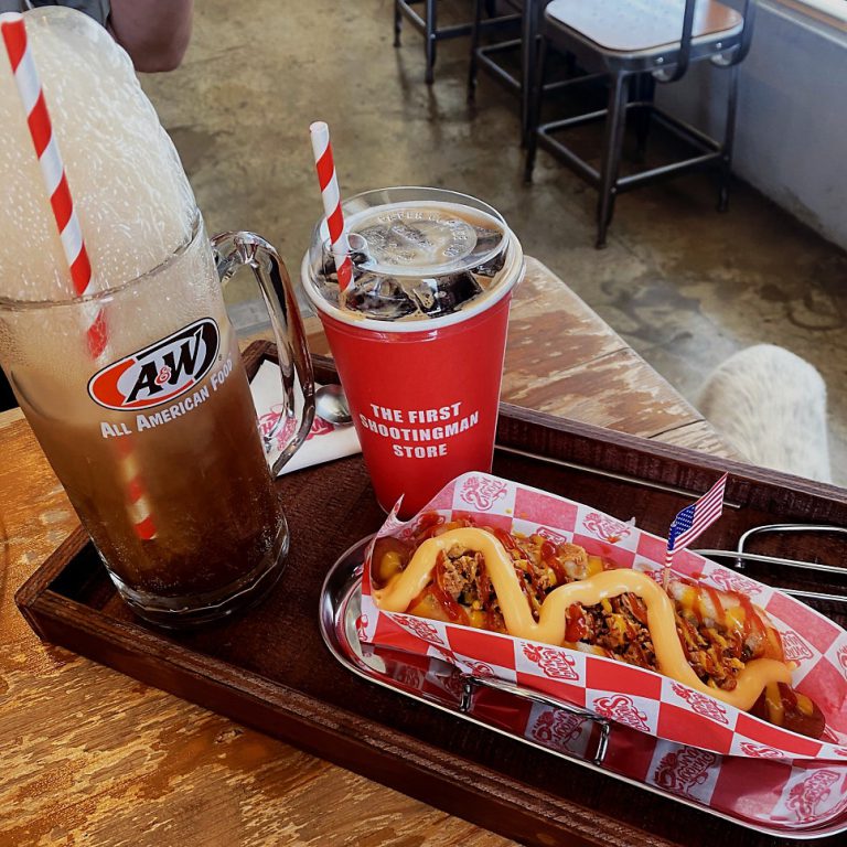 A&W-style root beer float and a hot dog on a tray